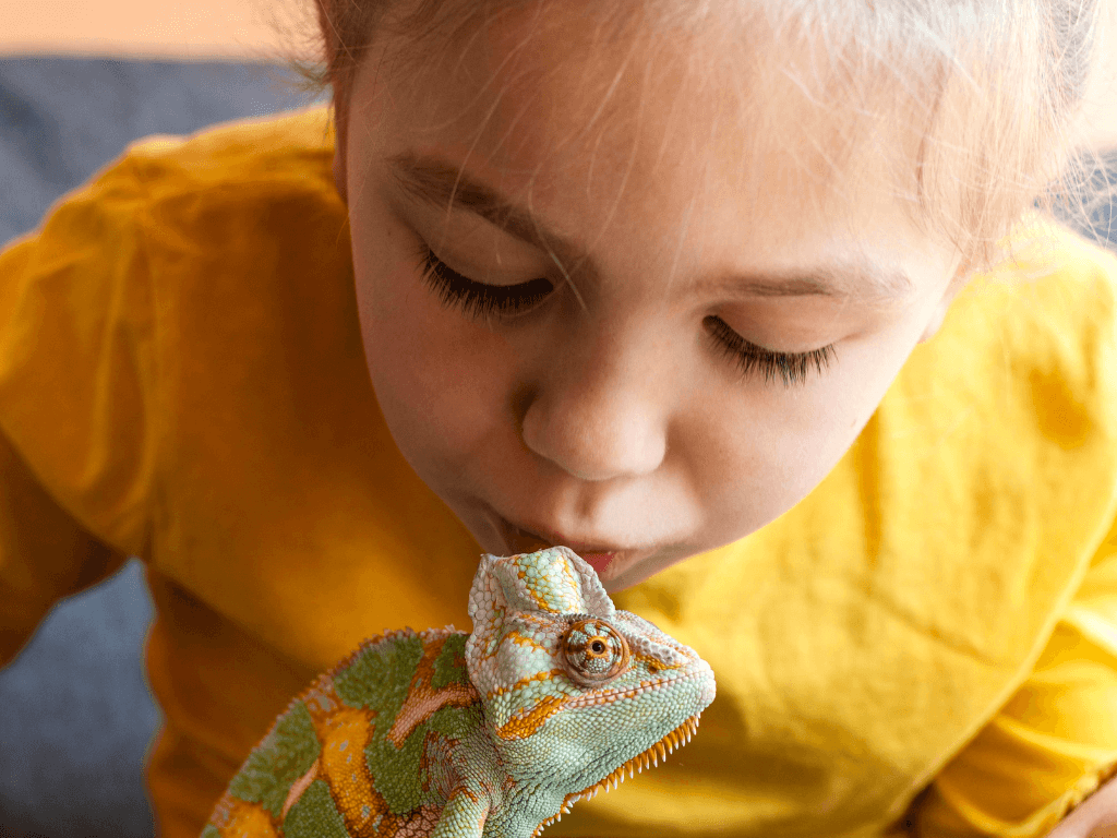 close-up-woman-kissing-chameleon