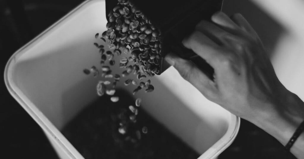 Pellet litter being poured into a storage container